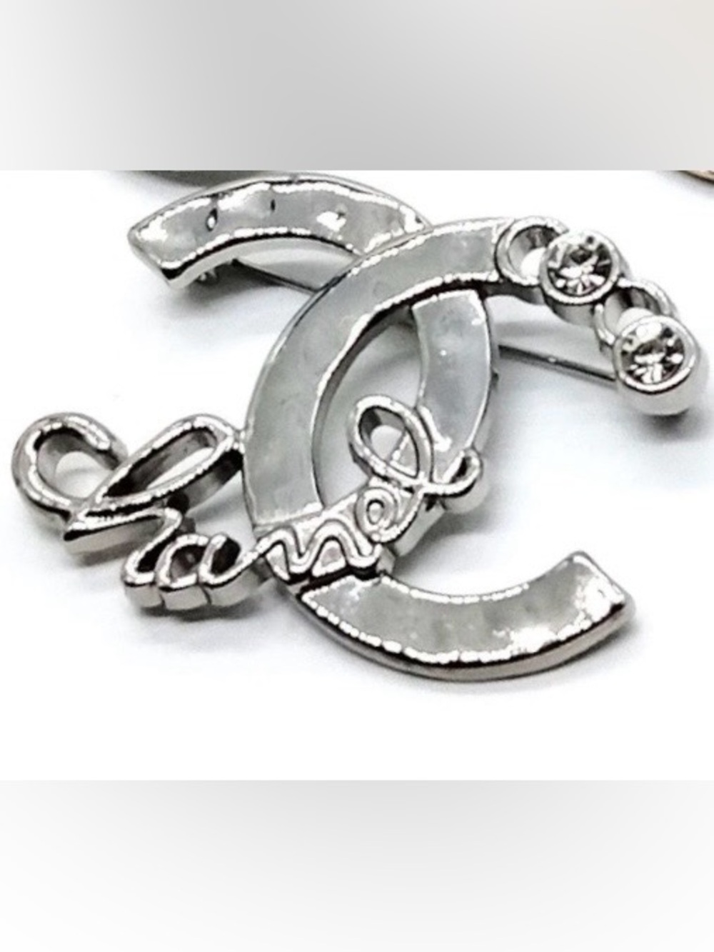 Authentic CHANEL CC Coco 2021 brooch in silver